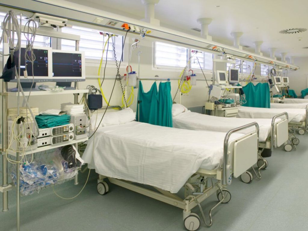 A row of hospital beds after discharge