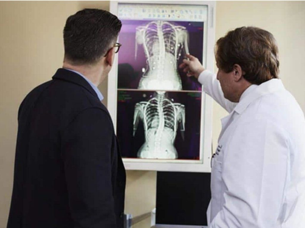 Doctor and patient looking at a chest xray